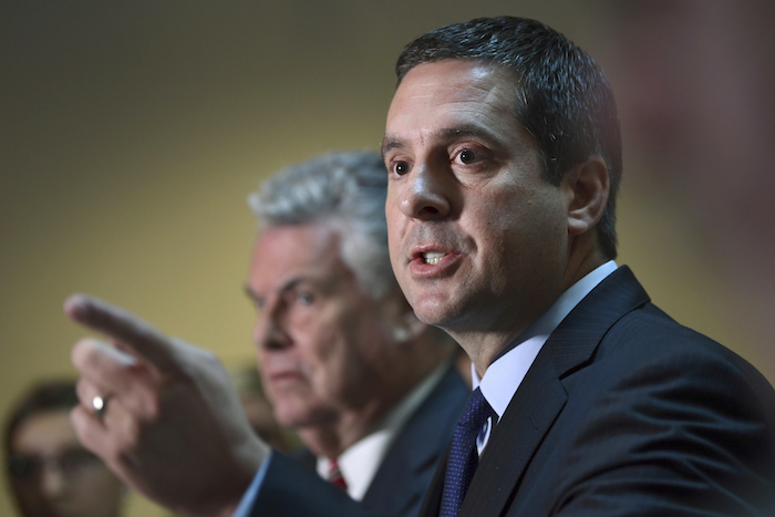 House Intelligence committee Chairman Rep. Devin Nunes, R-Calif., right, standing with Rep. Peter King, R-N.Y., left, speaks on Capitol Hill in Washington, Tuesday, Oct. 24, 2017. (AP Photo/Susan Walsh)