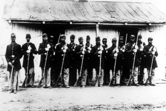 Exchange Black Civil War Soldiers ADVANCE FOR USE SATURDAY, FEB. 6, AND THEREAFTER - FILE - This is an undated 1860's file photo of a military police detachment, known as provost guards, of the 107th U.S. Colored Infantry lined up at Fort Corcoran near Washington, D.C. It's been 150 years since black soldiers from U.S. Colored Infantry units began returning home from their service in the South, where more than 175,000 members fought - and in some cases, died - to free fellow African-Americans from slavery. (AP Photo/Library of Congress, File)