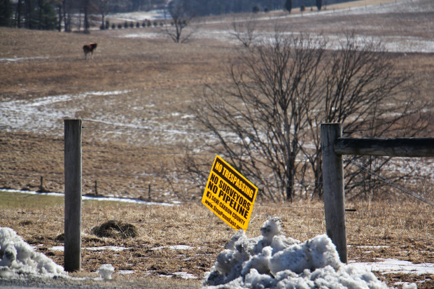 A sign on farmland near Palmerton in northeast Pennsylvania shows local opposition to the PennEast pipleline. In order to build the pipeline, PennEast Pipeline Co. is trying to seize through eminent domain some lands that are under farmland preservation.