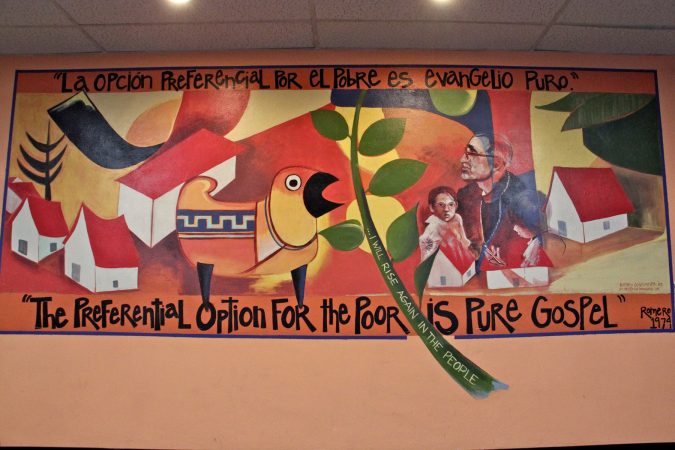 A mural depicting Oscar Romero, by Sister Helen D. Brancato, at the Romero Center in Camden. (Emma Lee/WHYY)