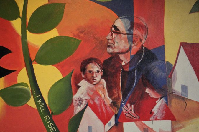 A detail from the mural depicting Oscar Romero at the Romero Center in Camden. (Emma Lee/WHYY)
