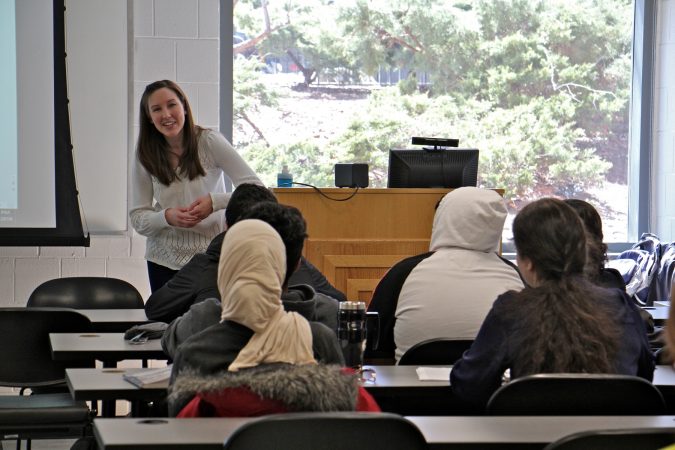 Ann Draemel engages her students in conversation during an intensive English course for international students at Temple University. (Emma Lee/WHYY)