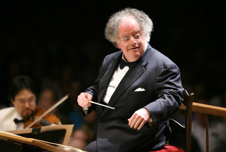 FILE - In this July 7, 2006 file photo, Boston Symphony Orchestra music director James Levine conducts the symphony on its opening night performance at Tanglewood in Lenox, Mass. The Met Opera has fired music director emeritus James Levine, finding 