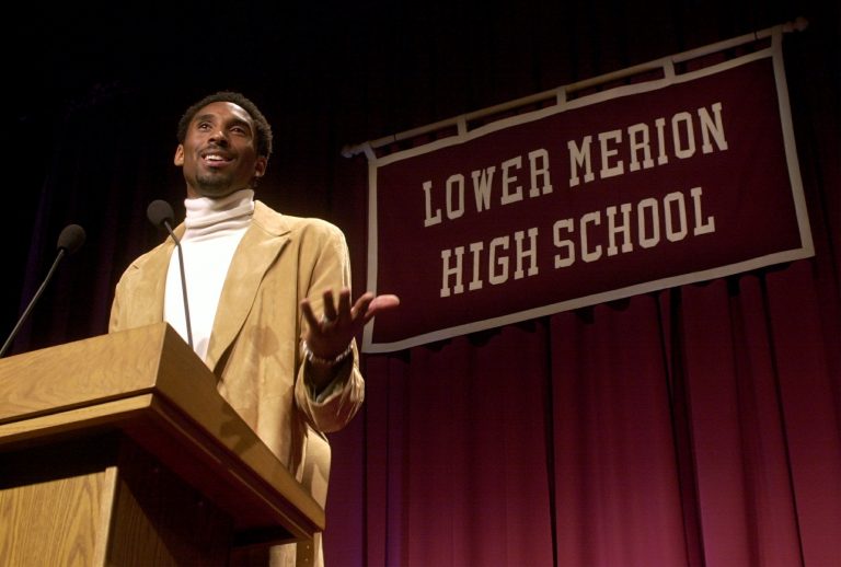 Los Angeles Lakers' Kobe Bryant speaks at Lower Merion High School in Ardmore, Pa., Saturday, Jan. 26, 2002, where Bryant's high school jersey number, 33, was retired during a ceremony.