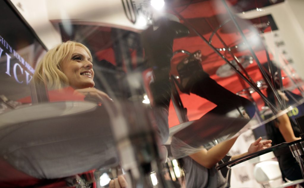 Adult Entertainment Adult film star Stormy Daniels, left, signs autographs at the AVN Adult Entertainment Expo in Las Vegas, Sunday, Jan. 11, 2009.