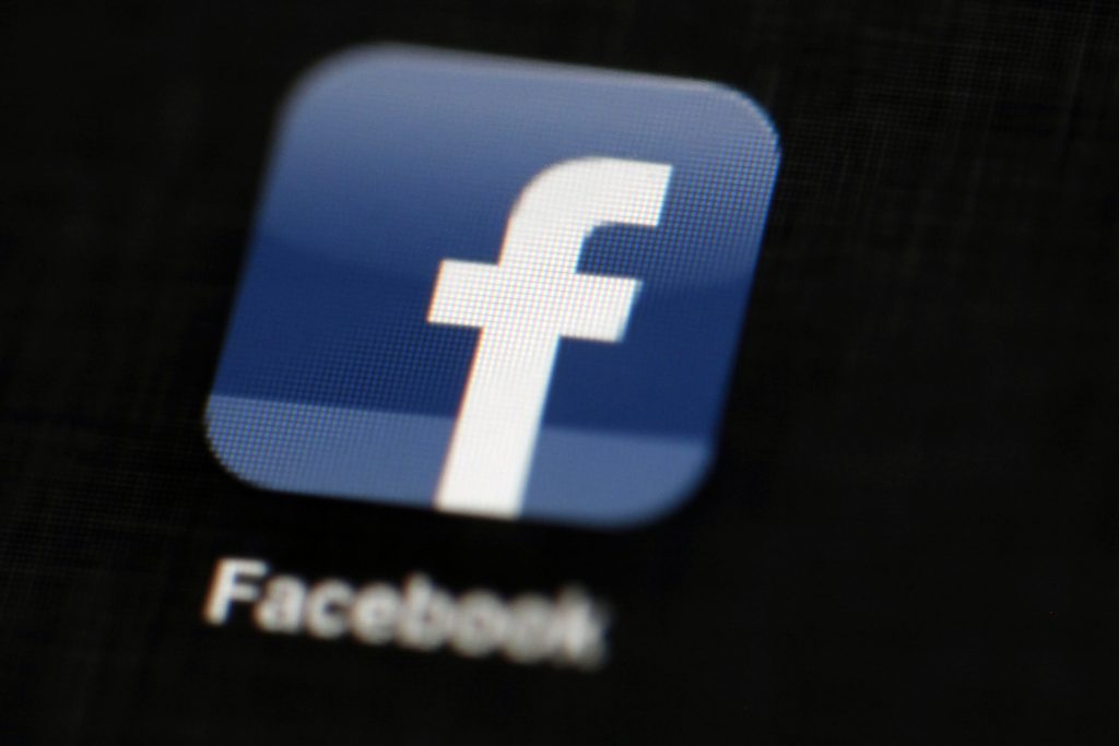 Earns Facebook In this May 16, 2012, file photo, the Facebook logo is displayed on an iPad in Philadelphia. Facebook suspended Cambridge Analytica, a data-analysis firm that worked for President Donald Trump's 2016 campaign, over allegations that it held onto improperly obtained user data after telling Facebook it had deleted the information. (Matt Rourke/AP Photo, File)