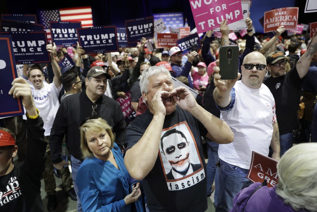 Campaign 2016 Trump People chant toward the media area before a rally with Republican presidential candidate Donald Trump, Saturday, Nov. 5, 2016, in Reno, Nev. (AP Photo/John Locher)