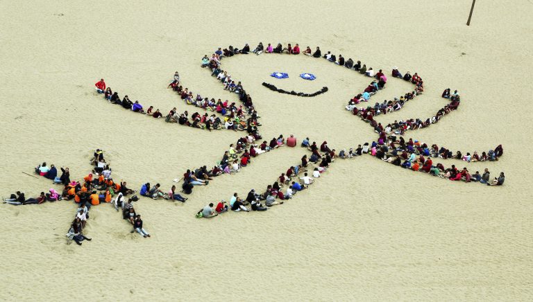 After cleaning up the beach, students create a smiling octopus and other ocean artwork during the 24th annual Kids Ocean Day beach cleanup at Dockweiler State Beach in Los Angeles Thursday, May 25, 2017. Some 4,000 children from Los Angeles-area elementary schools took part, the culmination of a year-round program by the Malibu Foundation for Environmental Education, which seeks to tell children how pollution affects the ocean. (Reed Saxon/AP Photo)