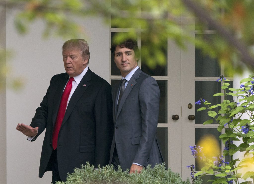 Donald Trump, Justin Trudeau President Donald Trump and Canadian Prime Minister Justin Trudeau walk along the Colonnade to the Oval Office of the White House in Washington, Wednesday, Oct. 11, 2017.