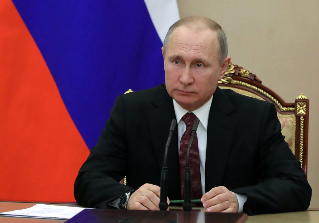 Russia Sanctions In this Jan. 26, 2018, photo, Russian President Vladimir Putin chairs a Security Council meeting in Moscow, Russia. The State Department has notified Congress that it will not impose new sanctions on Russia at this time. The State Department says it is confident that new legislation enacted last year is significantly deterring Russian defense sales. (Mikhail Klimentyev, Sputnik, Kremlin Pool Photo via AP)