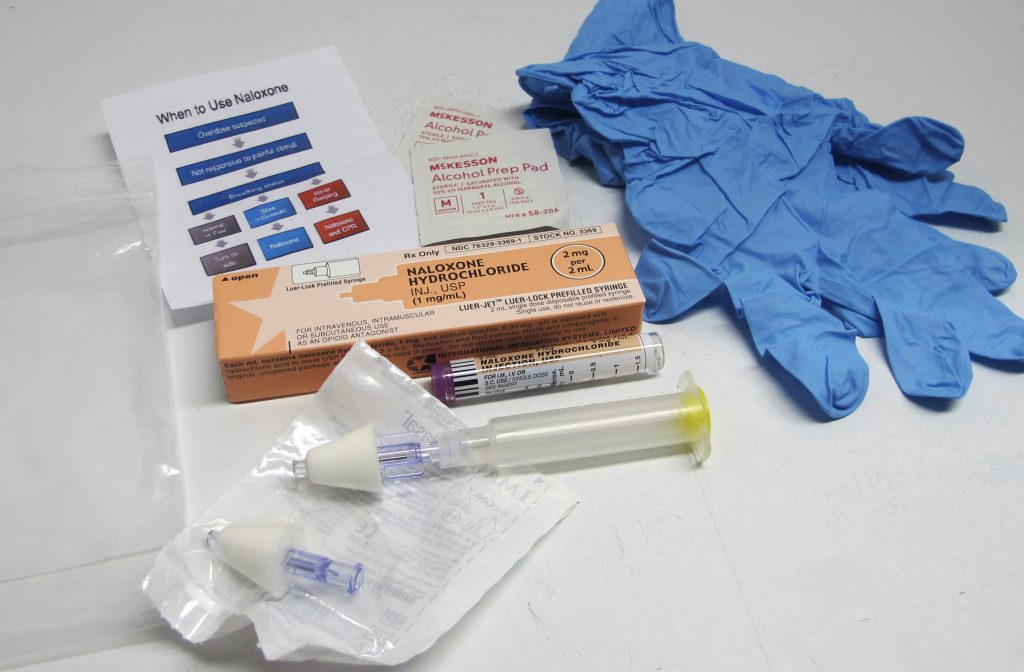 Opioid Hospitalizations Kids Materials necesarry for administering naloxone are visible.