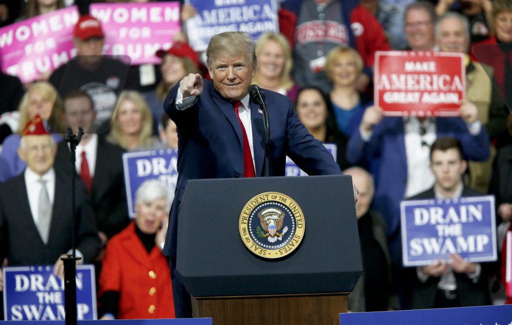 Donald Trump President Donald Trump reacts to the crowd while speaking at a campaign rally for Republican Rick Saccone in a hangar, Saturday, March 10, 2018, in Moon Township, Pa. Saccone is running against Democrat Conor Lamb in a special election being held on March 13 for the Pennsylvania 18th Congressional District vacated by Republican Tim Murphy.