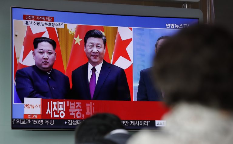 People watch a news program on TV reporting about the meeting between North Korean leader Kim Jong Un and Chinese President Xi Jinping at the Seoul Railway Station in Seoul, South Korea, Wednesday, March 28, 2018. North Korea's leader Kim and his Chinese counterpart Xi sought to portray strong ties between the neighbors and long-time allies despite a recent chill, as both countries on Wednesday confirmed Kim's secret trip to Beijing this week. (Lee Jin-man/AP Photo)
