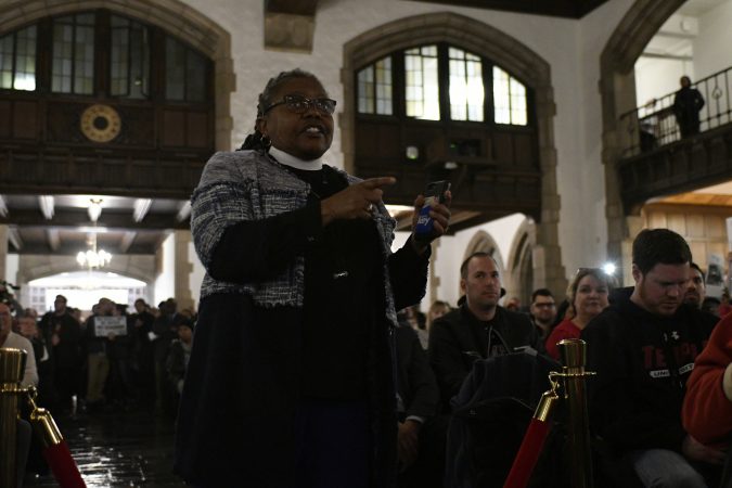 Community members, activist and students shut down a town hall meeting about the proposed $130 million, 35,000 seat stadium on Temple's campus, on Tuesday. (Bastiaan Slabbers/for WHYY)