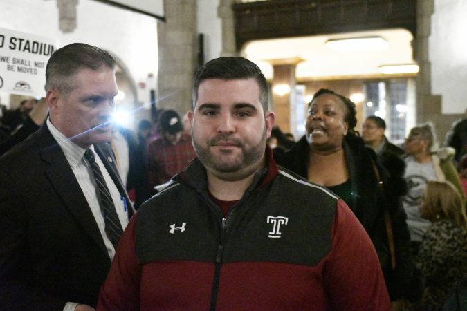 Community members, activist and students shut down a town hall meeting about the proposed $130 million, 35,000 seat  stadium on Temple's campus, on Tuesday. (Bastiaan Slabbers/for WHYY)
