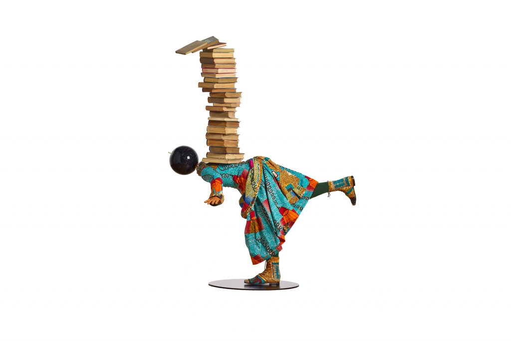 Girl Balancing Knowledge III–FLOOR OUTx1200 Girl Balancing Knowledge by Yinka Shonibare (Provided)