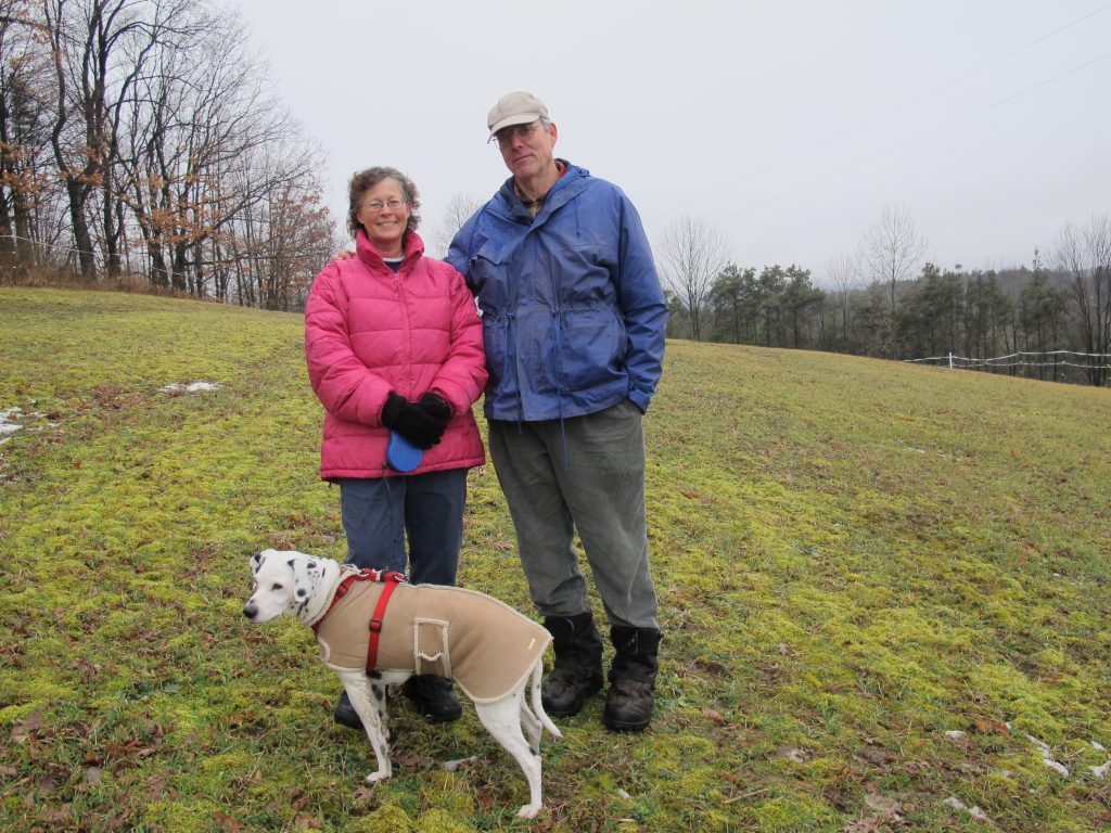 IMG_0801 Marianne and Rick Atkinson with their dog Spot, on their property in Clearfield County. (Susan Phillips/StateImpact Pennsylvania)