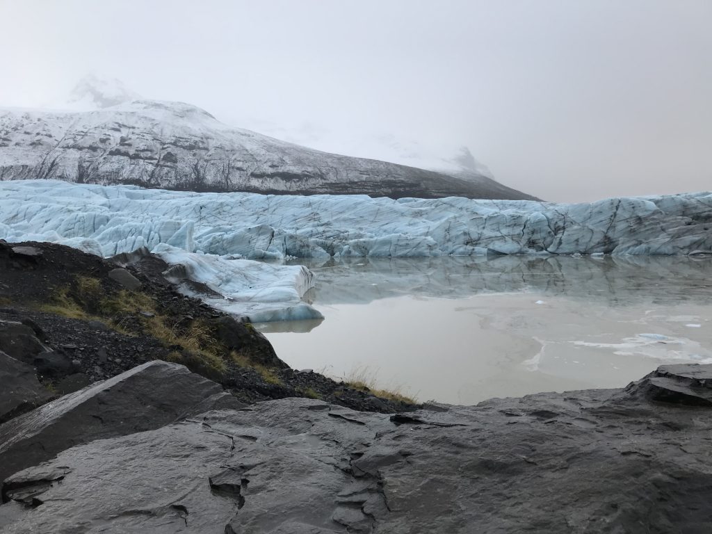 The Svínafellsjökull glacier in Iceland has retreated dramatically in recent years, revealing a visible sign of the changing climate. Since the early twentieth century, with few exceptions, glaciers around the world have been retreating at unprecedented rates. The melting ice contributes to global sea level rise. (Marie Cusick/StateImpact Pennsylvania)
