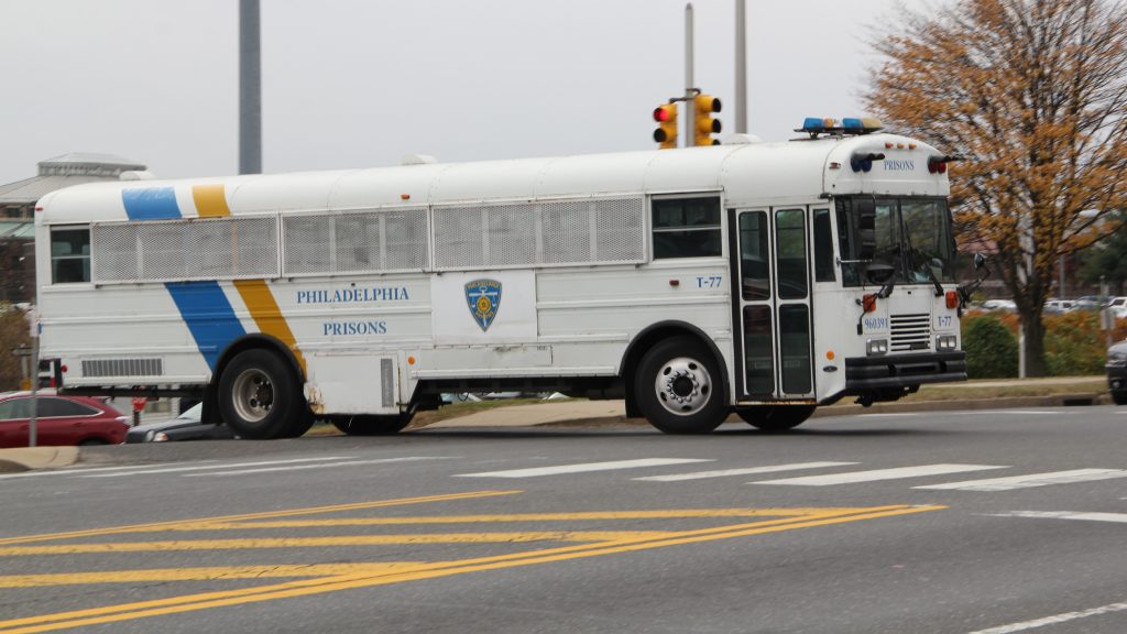 c A bus leaves the correctional complex on State Road in Philadelphia. (Emma Lee/for NewsWorks)