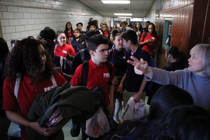 Students walk out of their classrooms at Pennsauken High School in solidarity with the victims of the Parkland, Florida, school shootings.