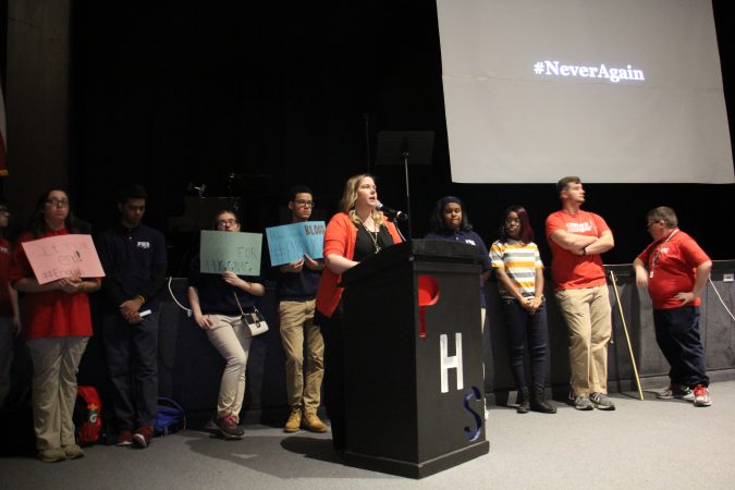 Pennsauken High School Vice Principal Caroline Steer and student leaders hold an assembly before the walkout to remember the victims of the Parkland school shooting.