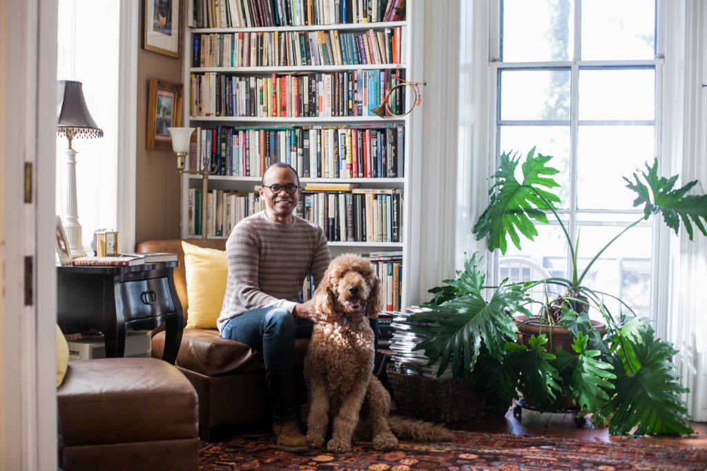 James_Earl_Davis_Germantown-2 James Earl Davis, a Professor of Urban Education at Temple University and his golden Doodle, Baldwin, pictured in his home in East Germantown.