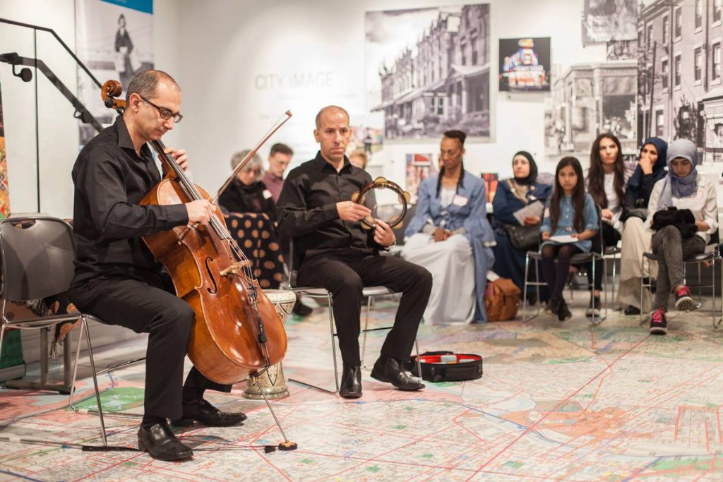 Kinan and Hafez – By Chip Colsonx1200 Syrian composer and cellist Kinan Abuo-afach, of