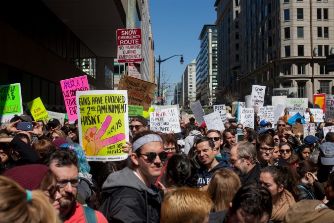 Demonstrators flood 12th Street in downtown Washington D.C during the March for Our Lives Saturday afternoon. (Brad Larrison for WHYY)