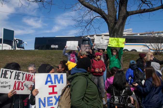 Students from Science Leadership Academy Beeber Campus prepare to make their way to the March for Our Lives in Washington D.C Saturday. (Brad Larrison for WHYY)