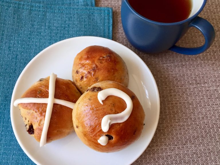 Decorating Easter buns with a variety of symbols is an inclusive way to share holiday food. (Kim Vukovich)