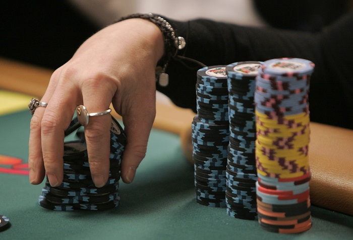Annie Duke Professional poker player Annie Duke shuffles her chips during the US$50,000 buy-in HORSE event of World Series of Poker at the Rio hotel-casino in Las Vegas, Monday, June 25, 2007. (AP Photo/Jae C. Hong)