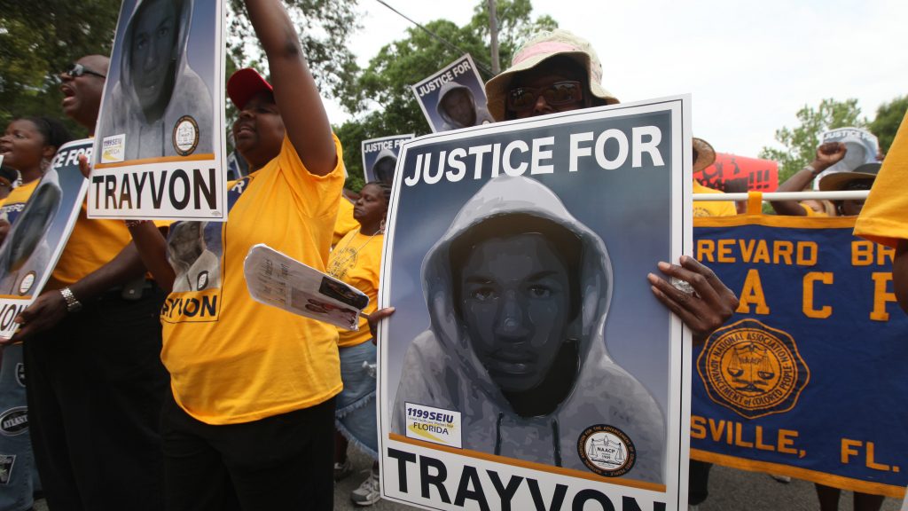 Protesters hold up signs in a march and rally for slain Florida teenager Trayvon Martin in Sanford, Fla., on March 31, 2012. Protesters hold up signs in a march and rally for slain Florida teenager Trayvon Martin in Sanford, Fla., on March 31, 2012. (Julie Fletcher/AP)
