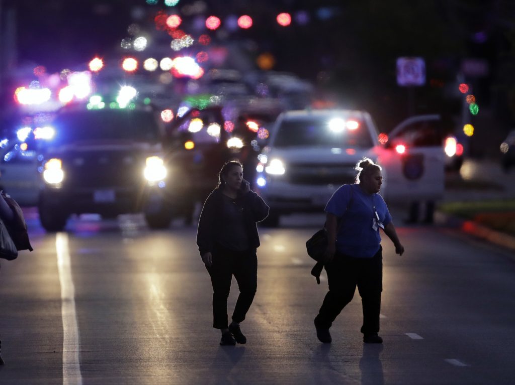 People evacuate as emergency vehicles stage near the site of another explosion on Tuesday in Austin, Texas. People evacuate as emergency vehicles stage near the site of another explosion on Tuesday in Austin, Texas.