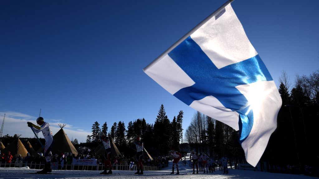 A fan waves the Finnish flag during the Nordic World Ski Championships last year. Finland is No. 1 on the annual World Happiness Report, released Wednesday. A fan waves the Finnish flag during the Nordic World Ski Championships last year. Finland is No. 1 on the annual World Happiness Report, released Wednesday. (Matthias Hangst/Getty Images)