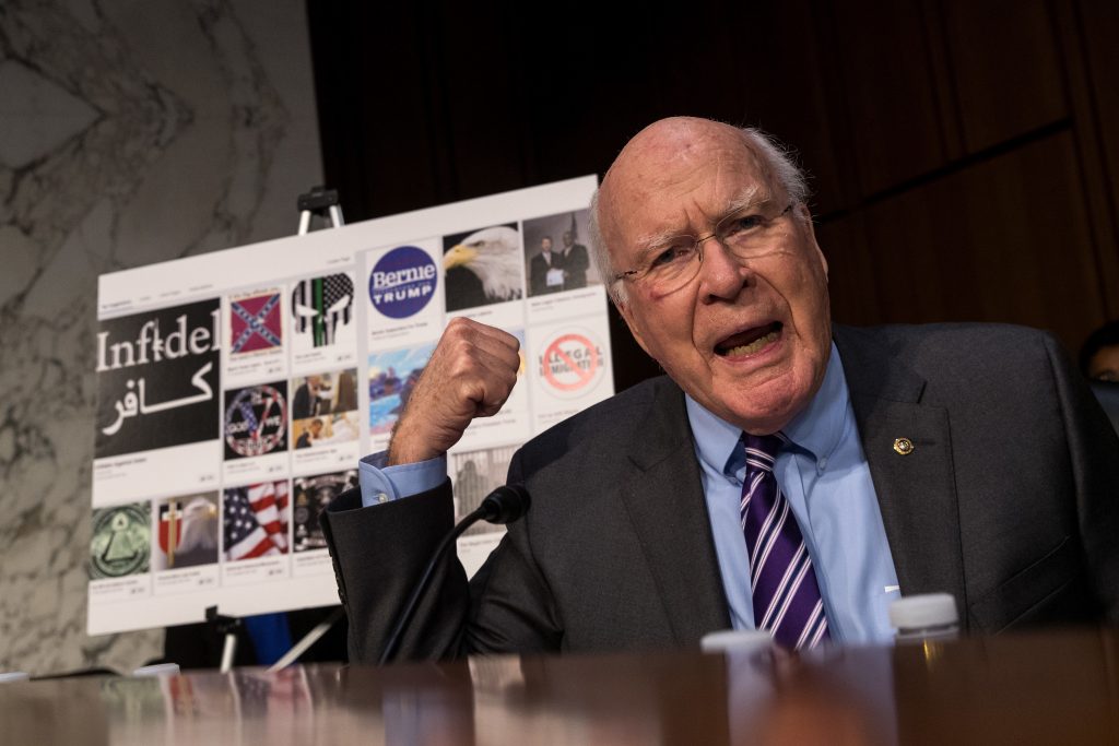 With examples of Russian-created Facebook pages behind him, Sen. Patrick Leahy, D-Vt., questions witnesses during a 2017 Senate hearing on Russian-backed ads on social media in the 2016 election. Now, the Federal Election Commission is looking into increasing disclosure requirements for online ads. With examples of Russian-created Facebook pages behind him, Sen. Patrick Leahy, D-Vt., questions witnesses during a 2017 Senate hearing on Russian-backed ads on social media in the 2016 election. Now, the Federal Election Commission is looking into increasing disclosure requirements for online ads. (Drew Angerer/Getty Images)