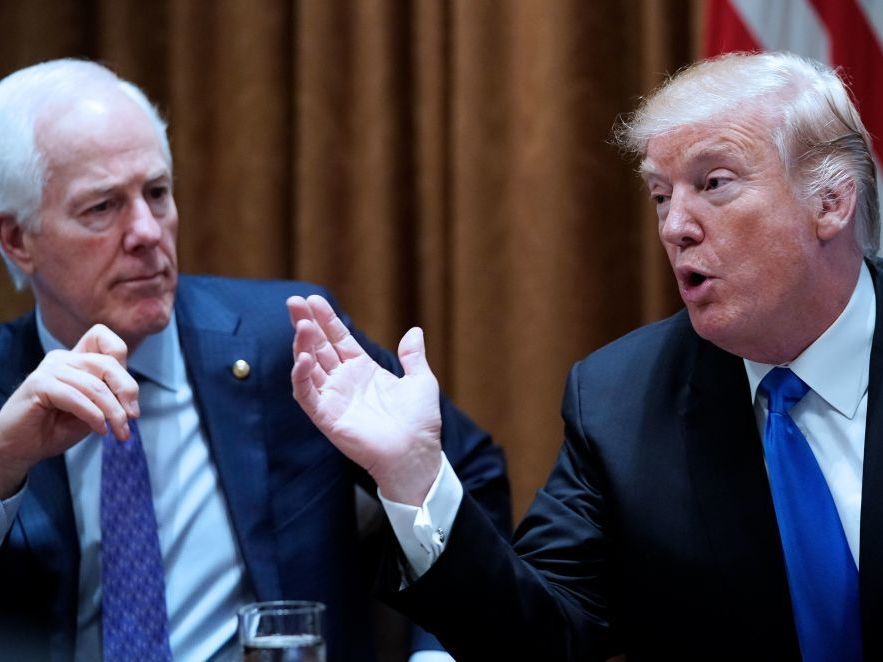 President Trump speaks, watched by Sen. John Cornyn, R-Texas, during a bipartisan meeting with members of Congress on school and community safety at the White House on Wednesday. President Trump speaks, watched by Sen. John Cornyn, R-Texas, during a bipartisan meeting with members of Congress on school and community safety at the White House on Wednesday. (Mandel Ngan/AFP/Getty Images)
