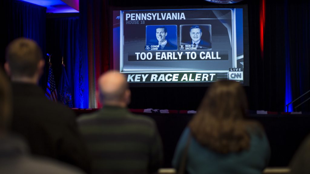 Supporters Democratic congressional candidate Conor Lamb await results on Tuesday night in Canonsburg, Pa. Lamb and Republican Rick Saccone were locked in a race that was declared too close to call hours after polls closed. Supporters Democratic congressional candidate Conor Lamb await results on Tuesday night in Canonsburg, Pa. Lamb and Republican Rick Saccone were locked in a race that was declared too close to call hours after polls closed. (Drew Angerer/Getty Images)