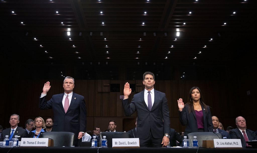 Acting Director of the Bureau of Alcohol, Tobacco, Firearms and Explosives Thomas Brandon (left), Acting Deputy Director of the Federal Bureau of Investigation David Bowdich (center) and U.S. Secret Service’s National Threat Assessment Center head Lina Alathari are sworn in before testifying to the Senate Judiciary Committee on Wednesday. Acting Director of the Bureau of Alcohol, Tobacco, Firearms and Explosives Thomas Brandon (left), Acting Deputy Director of the Federal Bureau of Investigation David Bowdich (center) and U.S. Secret Service's National Threat Assessment Center head Lina Alathari are sworn in before testifying to the Senate Judiciary Committee on Wednesday.
(Chip Somodevilla/Getty Images)