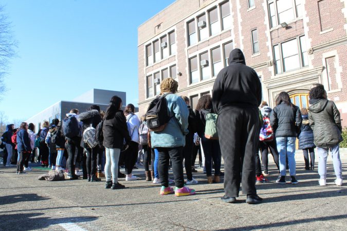 Students from Girard Academic Music Program in Philadelphia stand outside for 17 minutes of silence on March 14, 2018