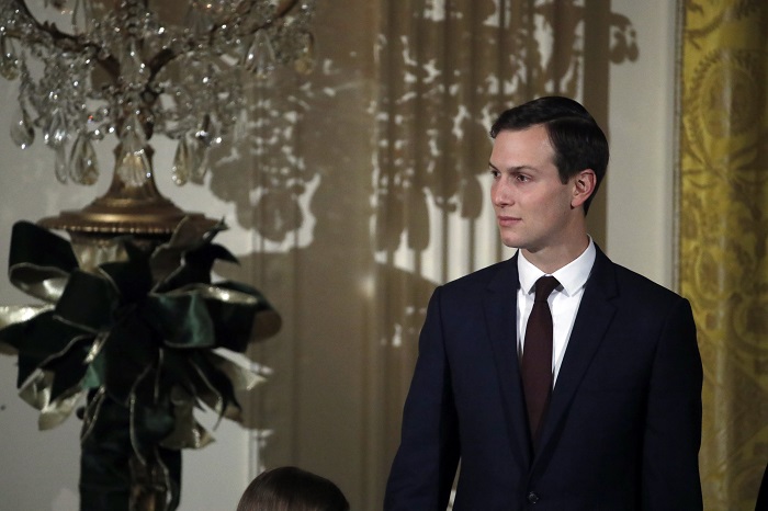 White House senior adviser Jared Kushner stands as President Donald Trump speaks during a Hanukkah reception in the East Room of the White House, Thursday, Dec. 7, 2017, in Washington. (AP Photo/Alex Brandon)