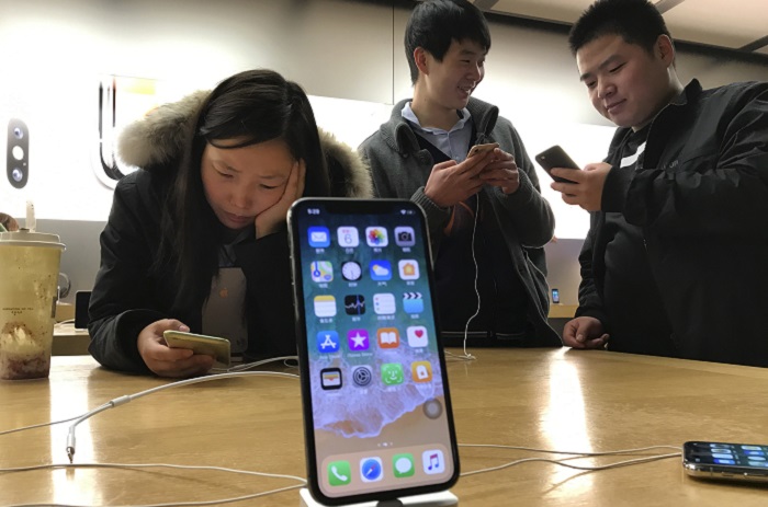 TEC–Digital Life-X Days With The iPhone X (AP Photo/Ng Han Guan, File)