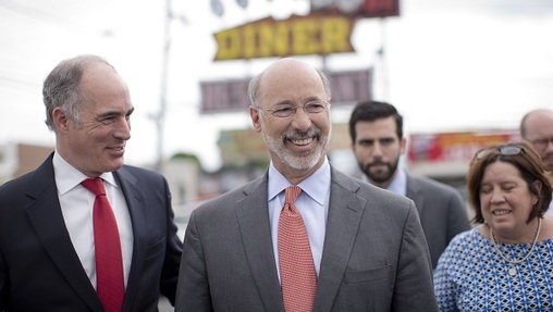 Gov. Tom Wolf walks with Sen. Bob Casey outside of the Oregon Diner, Friday, May 23, 2014, in Philadelphia. (Matt Rourke/AP Photo, file)