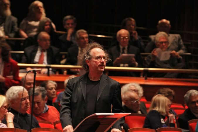Composer Tod Machover watches a rehearsal of his crowd-sourced composition, 