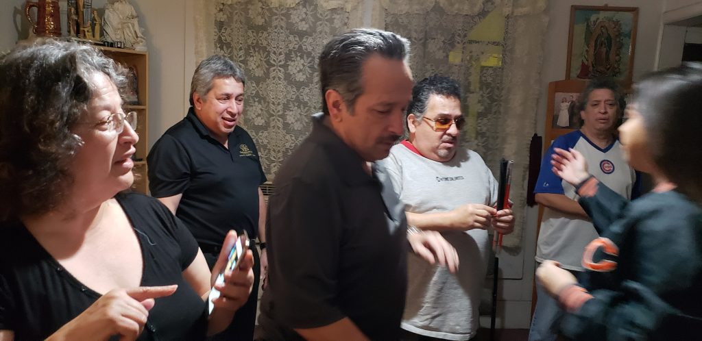 2018-04-09 20.27.17 The Cabrera family say their goodbyes after an evening of discussing their diabetes complications in their late parent’s house. (Kristen Cabrera/WHYY)