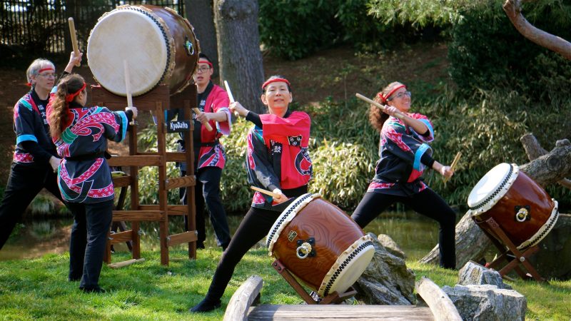 The Kyo Daiko drummers perform on the island at the Japanese House and Garden. (Emma Lee/WHYY)