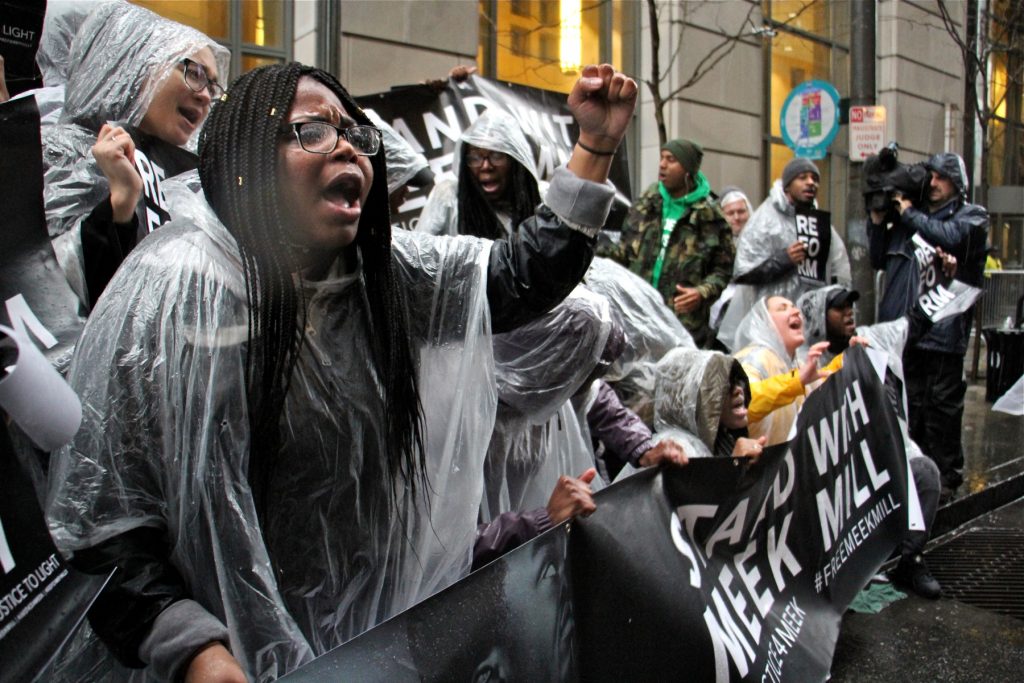Protesters chant 