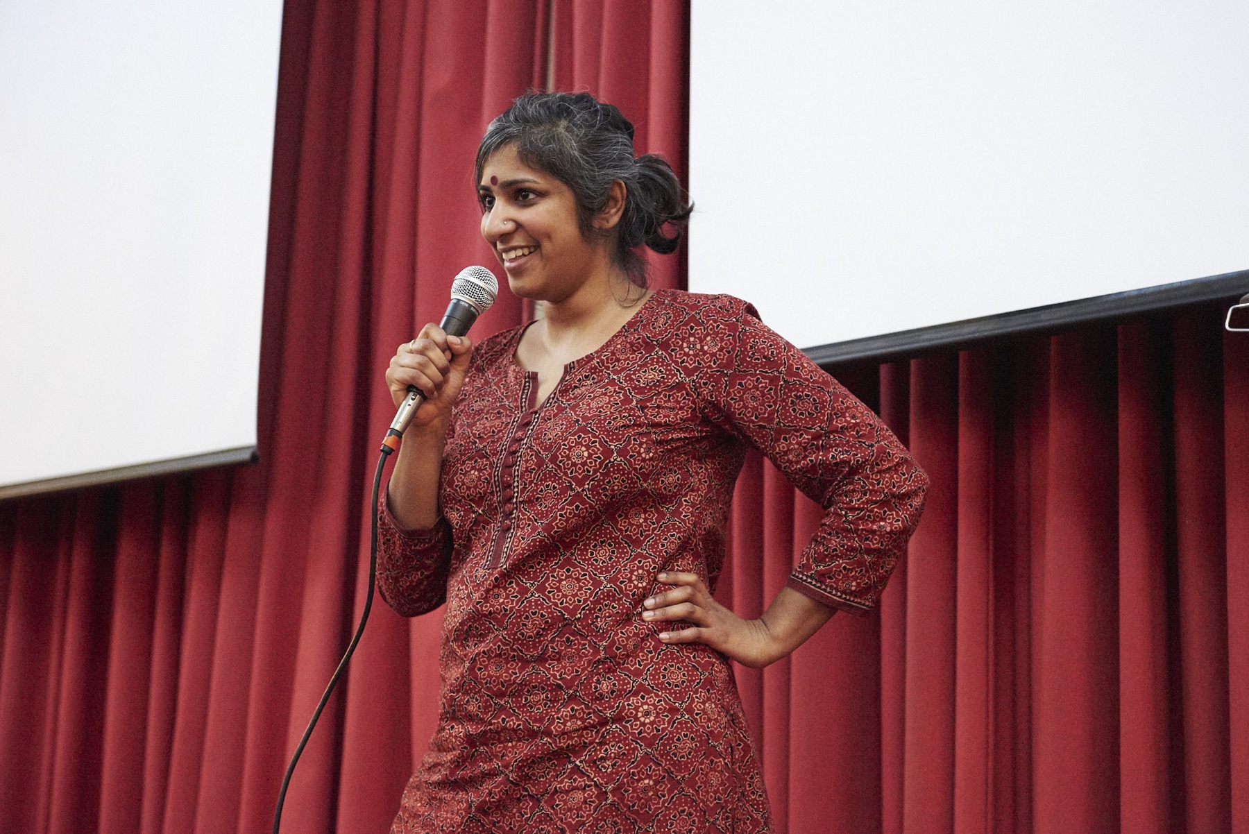 Meghna Chandra sings an extended rendition of Paul Robeson’s “Ol’ Man River,” incorporating a Hindi and Bengali version of the song. 