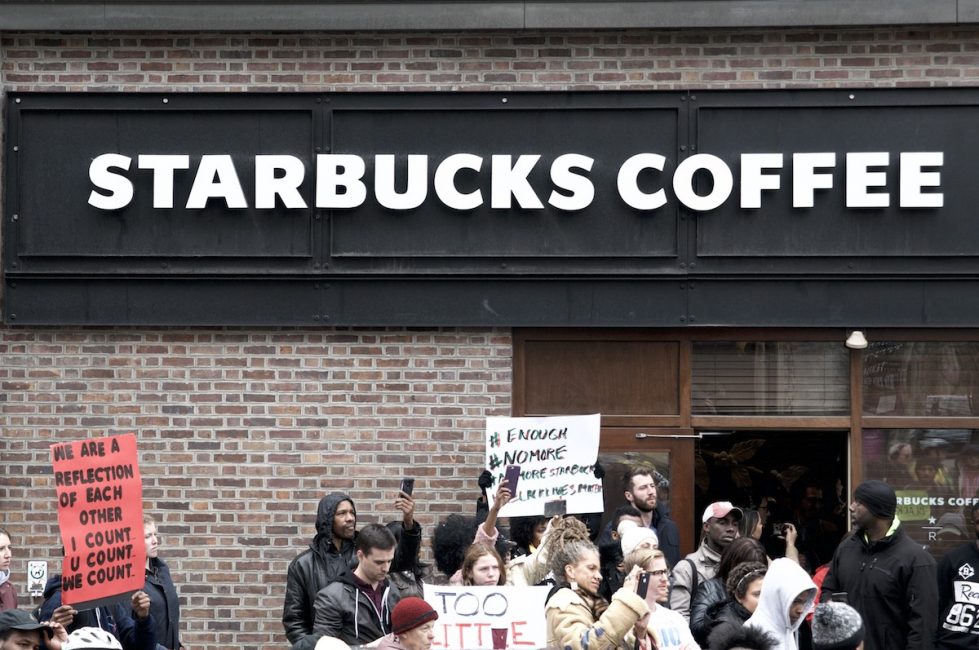20180415_Starbucks_Protest_BS1419_010__BS28438 People gather outside a Starbucks on 18th and Spruce streets in Philadelphia to protest Thursday's controversial arrests of two black men at the store. (Bastiaan Slabbers/for WHYY)
