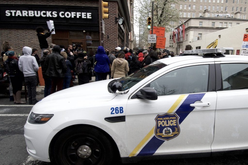 20180415_Starbucks_Protest_BS1419_015__BAS3905 People gather outside a Starbucks on 18th and Spruce streets in Philadelphia to protest Thursday's controversial arrests of two black men at the store. (Bastiaan Slabbers/for WHYY)