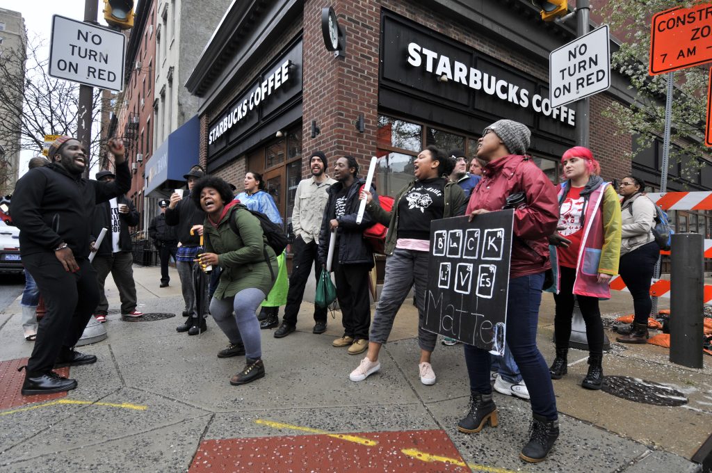 Protest at Strabucks About 50 protesters gathered inside the Starbucks near Rittenhouse Square on Monday morning to protest the recent arrest of two black men. (Bastiaan Slabbers for WHYY)